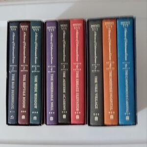 A box of unfortunate events boxed book set lemony snicket 1-9 hard cover